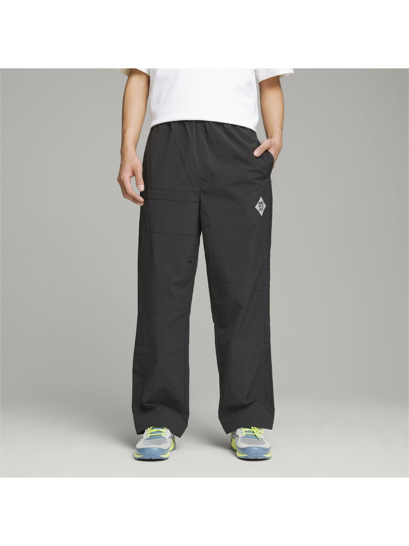 Штани PUMA x P.a.m. Woven Pants модель 538815 Фото