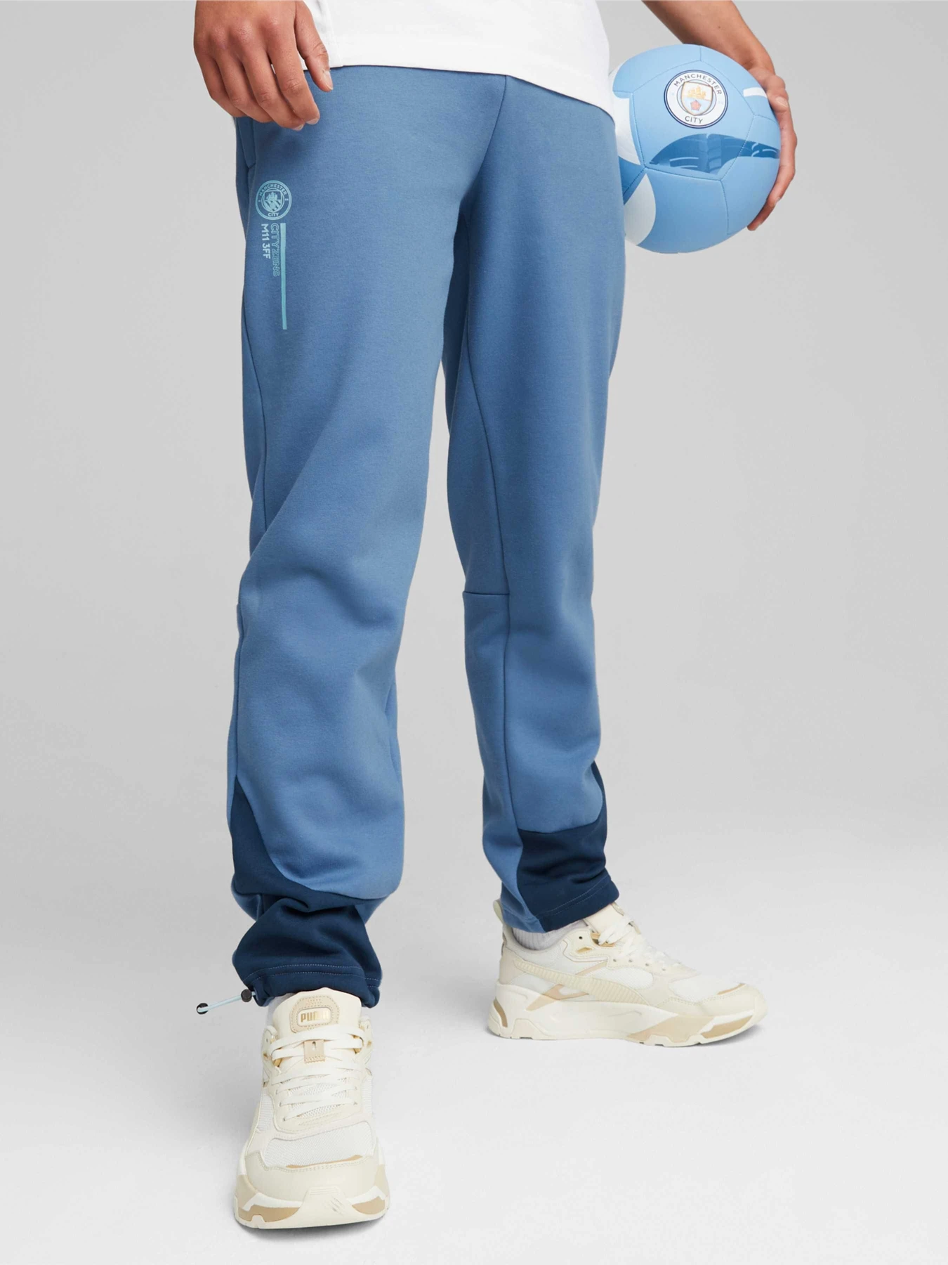 Штани PUMA Mcfc Ftblculture Pants модель 772967 Штани PUMA Mcfc Ftblculture Pants модель 772967 Фото