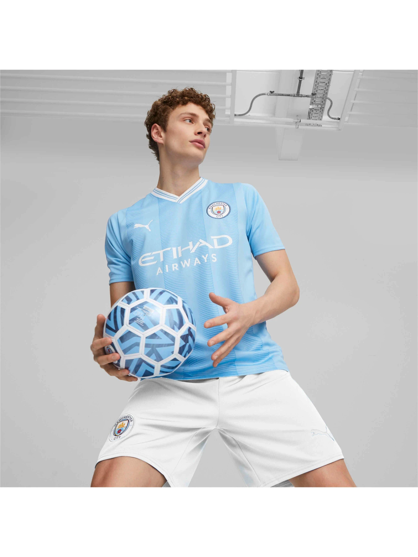 Футболки і поло PUMA Mcfc Home Jersey Replica модель 770438 Футболки і поло PUMA Mcfc Home Jersey Replica модель 770438 Фото