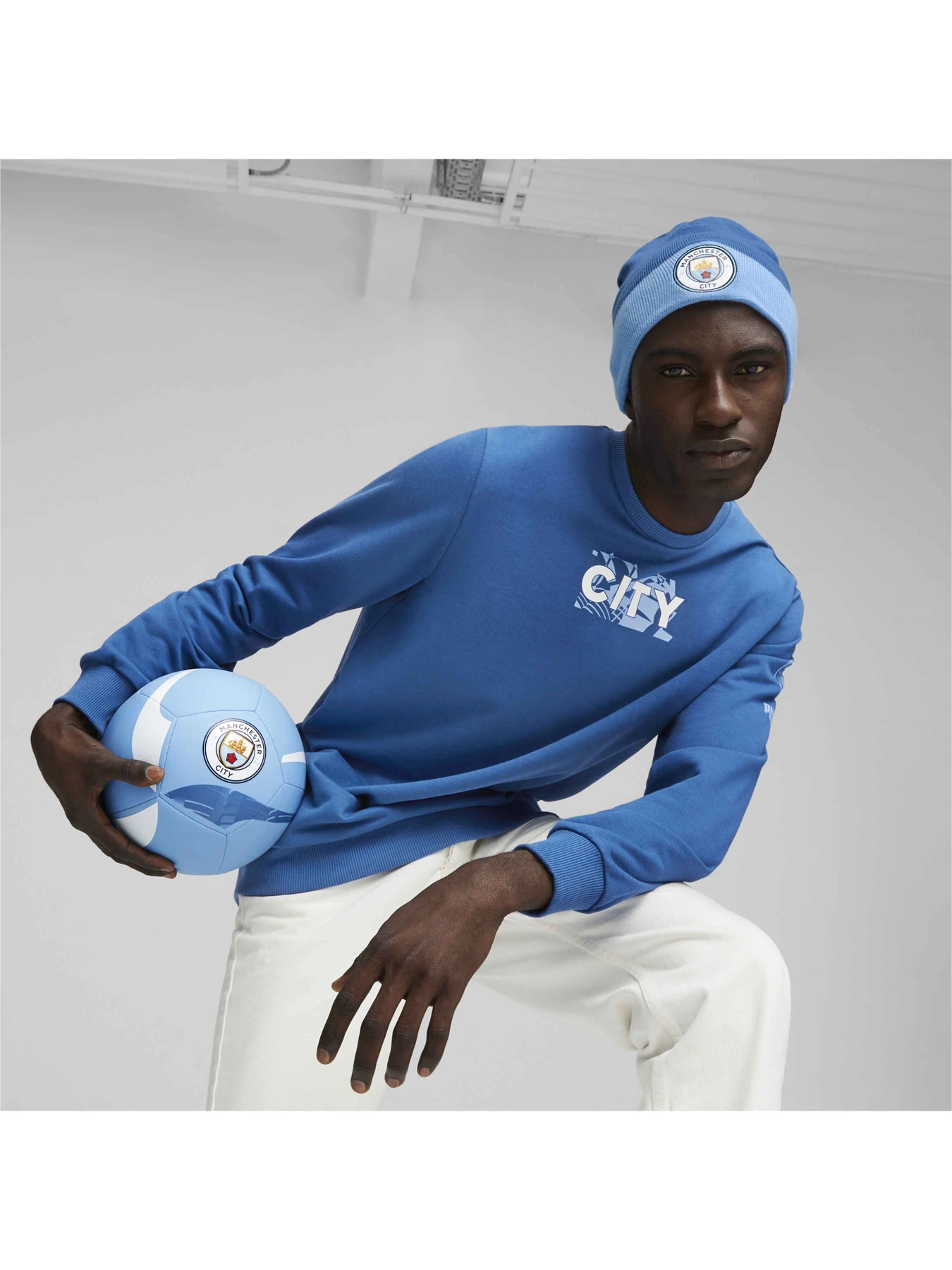 Шапки и кепки PUMA Mcfc Reversible Beanie модель 024859 Шапки и кепки PUMA Mcfc Reversible Beanie модель 024859 Фото