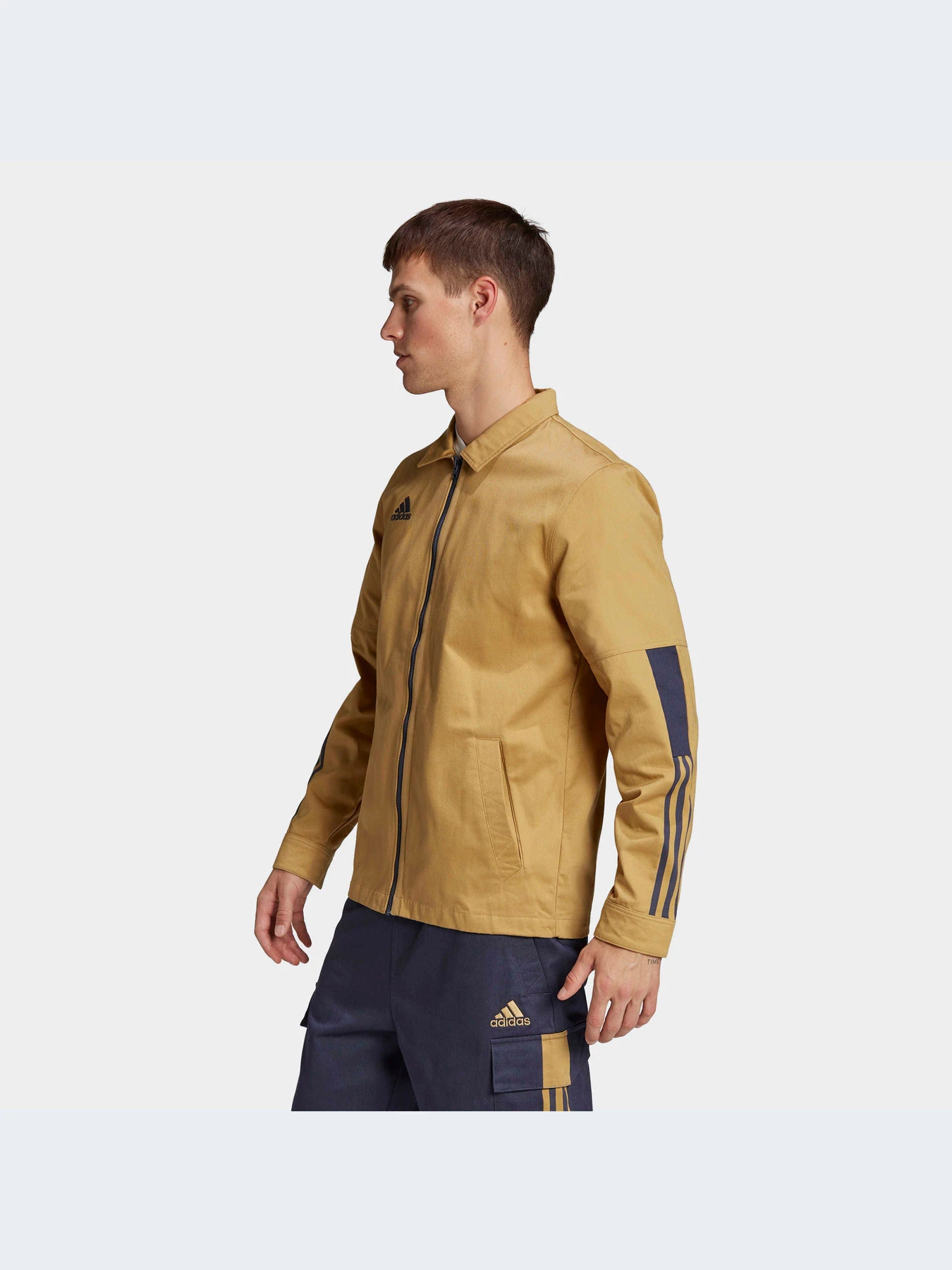 Куртки и дубленки Adidas Tiro модель H56616 Куртки и дубленки Adidas Tiro модель H56616 Фото