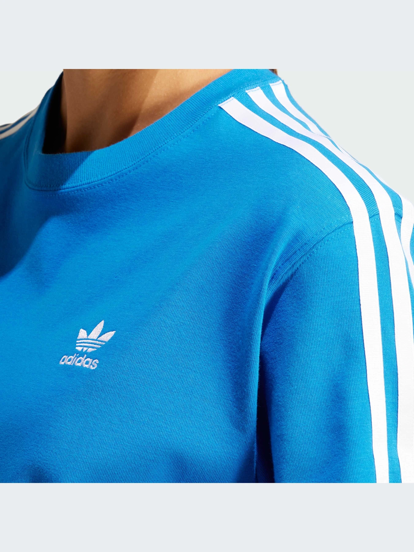 Футболки і поло Adidas Adicolor модель IR8049 Футболки і поло Adidas Adicolor модель IR8049 Фото