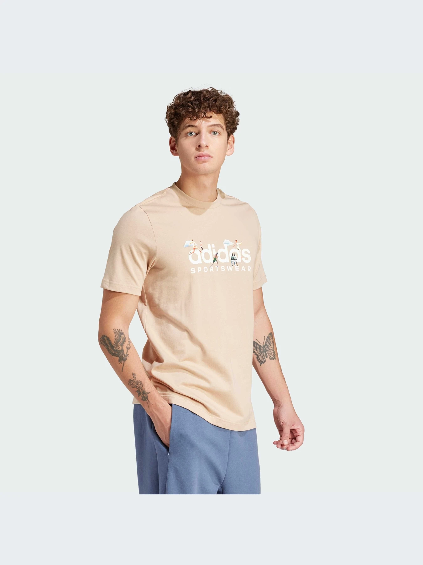 Футболки і поло Adidas Graphics модель IM8316 Футболки і поло Adidas Graphics модель IM8316 Фото