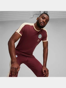 Футболки і поло PUMA Mcfc Ftblheritage T7 Tee модель 769495 Фото