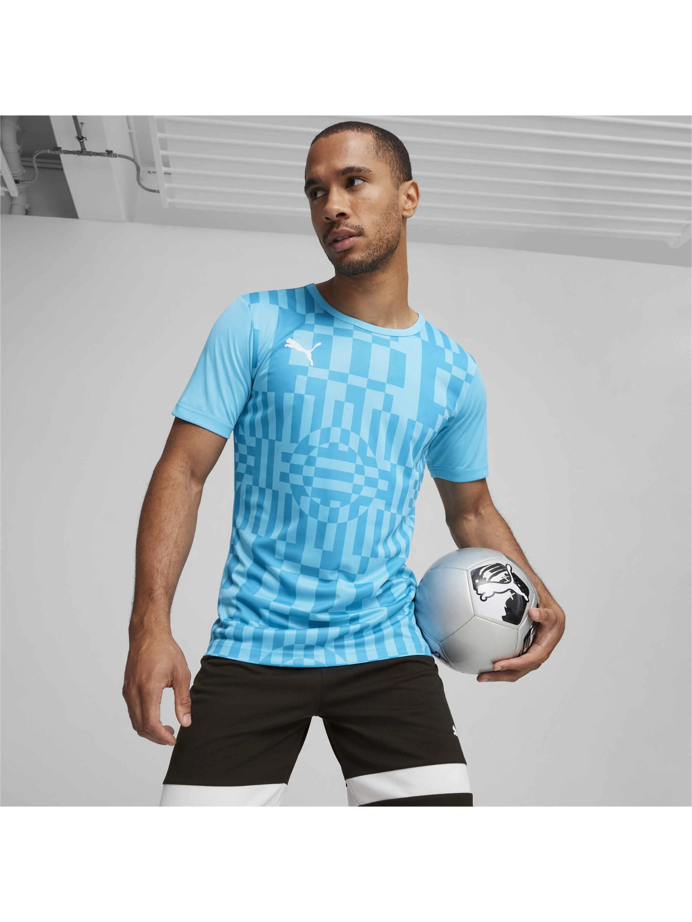 Футболки і поло PUMA Individualrise Graphicjersey модель 658614 Футболки і поло PUMA Individualrise Graphicjersey модель 658614 Фото