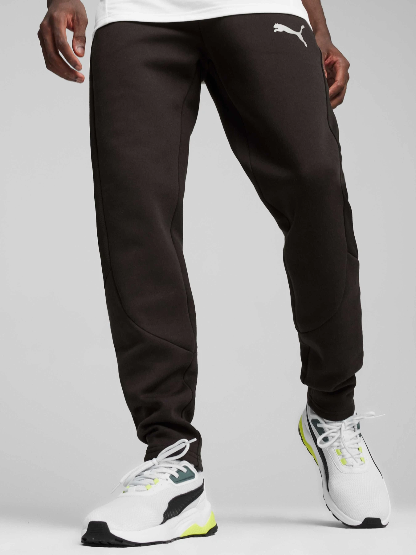Брюки PUMA Evostripe Pants Dk модель 678997 Брюки PUMA Evostripe Pants Dk модель 678997 Фото