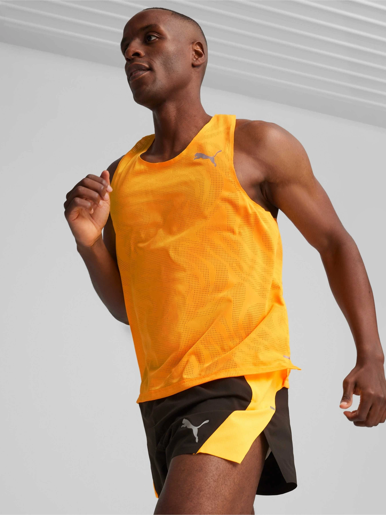 Футболки і поло PUMA Run Ultraspun Singlet модель 525057 Футболки і поло PUMA Run Ultraspun Singlet модель 525057 Фото