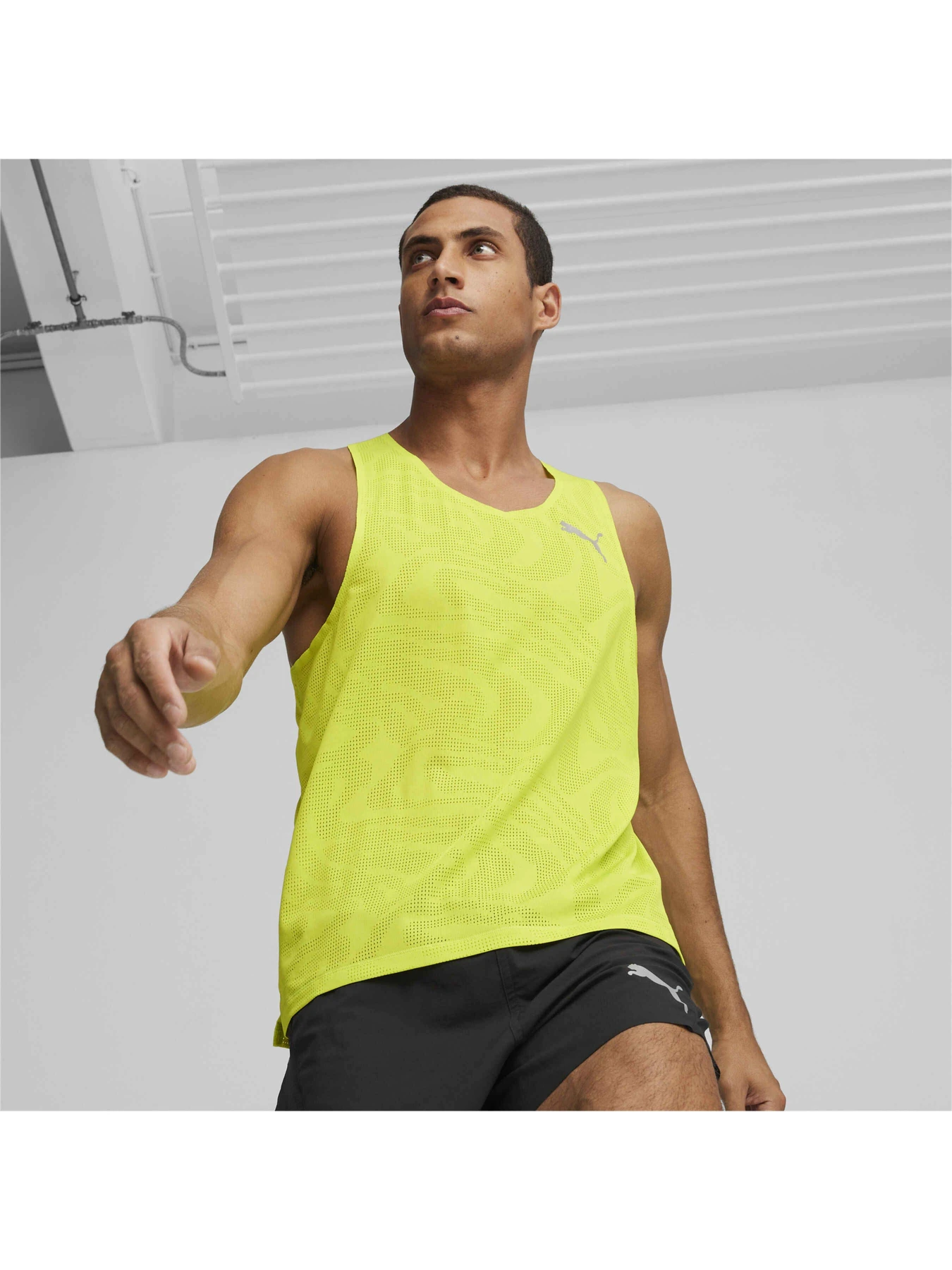 Футболки і поло PUMA Run Ultraspun Singlet модель 525057 Фото