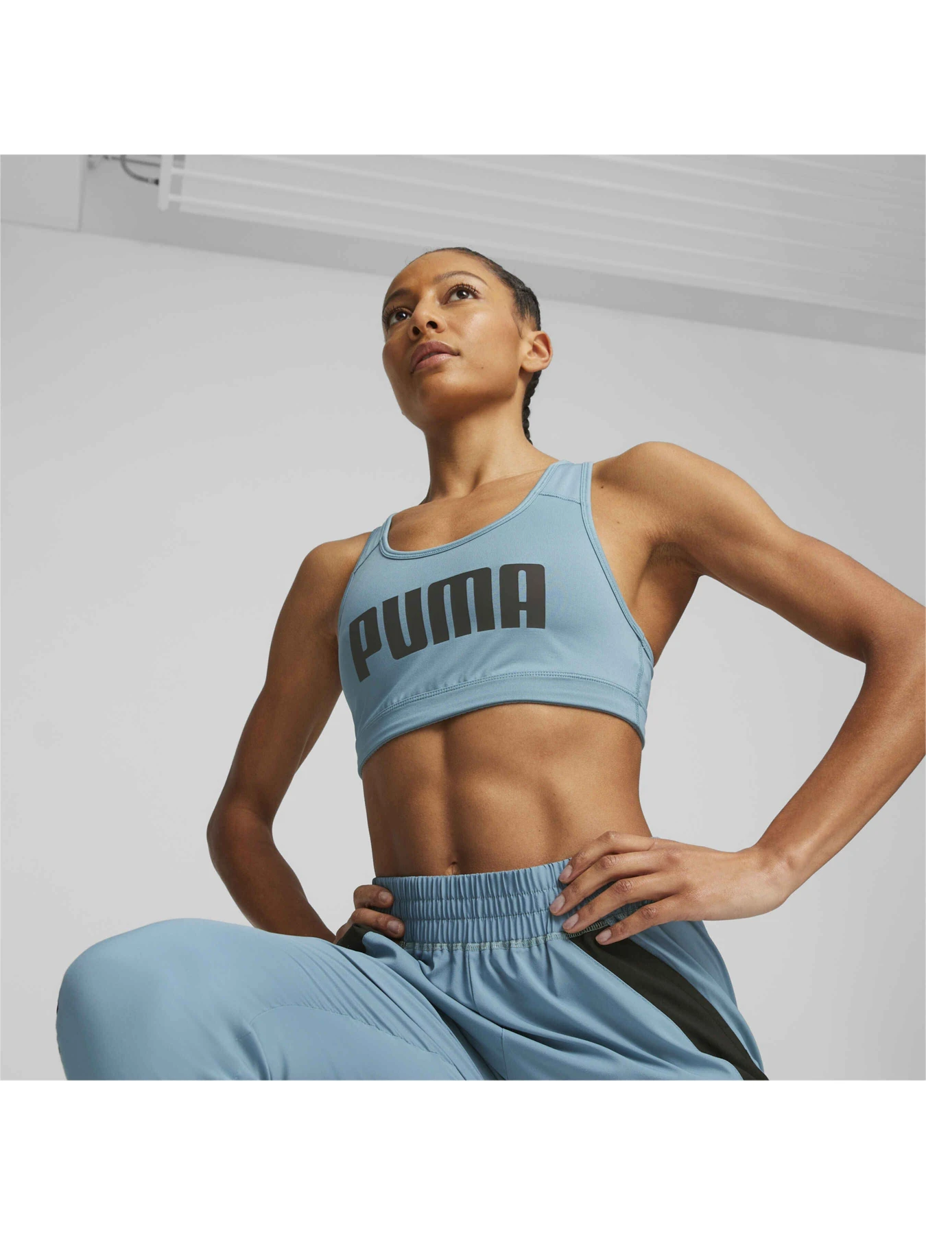 Футболки і поло PUMA Mid Impact 4keeps Bra модель 520304 Фото