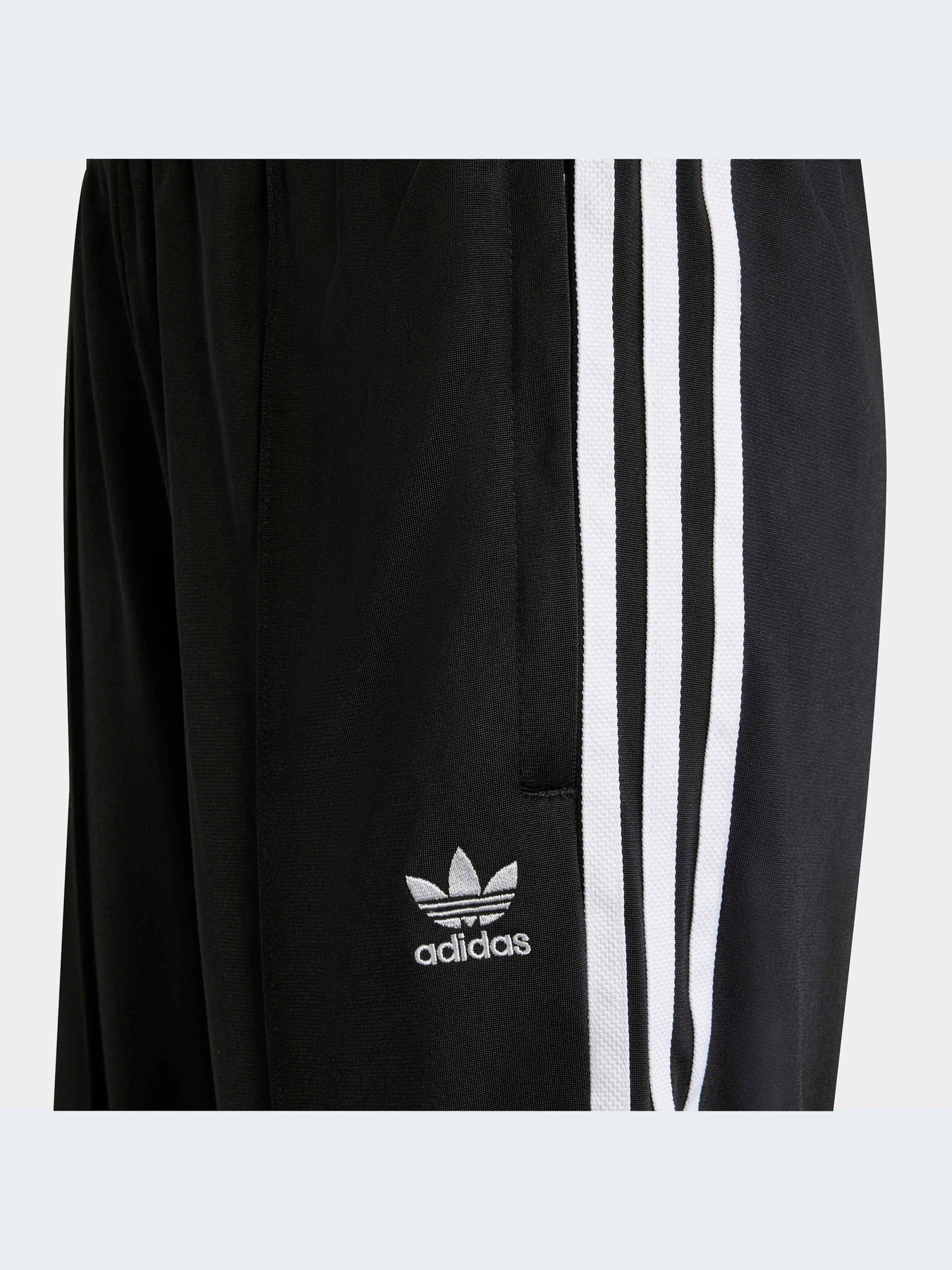 Брюки Adidas Adicolor модель HK0347 Брюки Adidas Adicolor модель HK0347 Фото