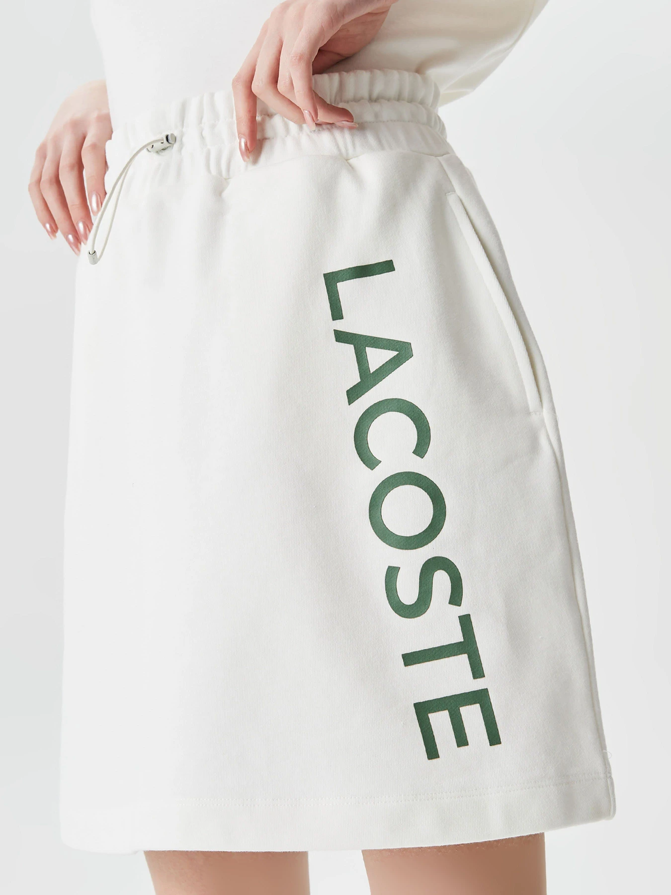 Юбки Lacoste модель JF030303B Юбки Lacoste модель JF030303B Фото