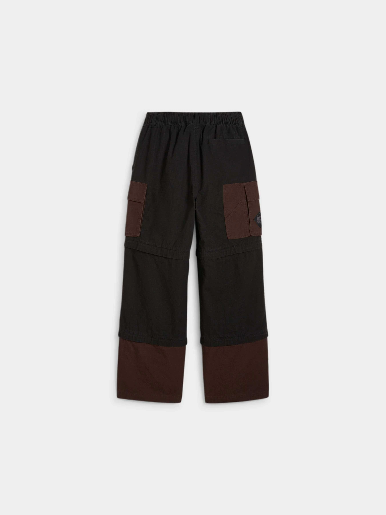 Брюки PUMA x P.a.m. Zip-off Pants модель 624073 Фото