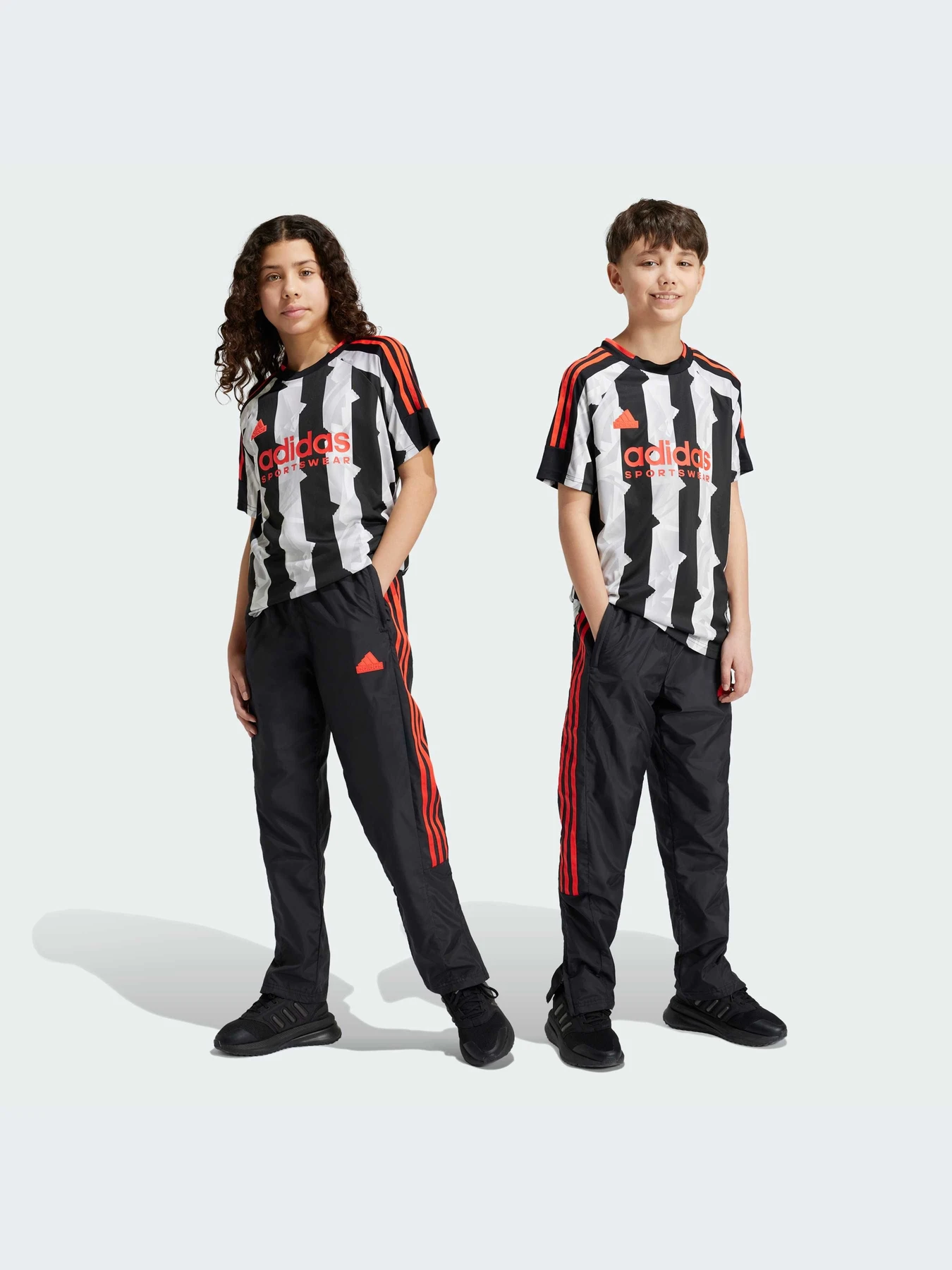 Брюки Adidas Tiro модель IV7104 Брюки Adidas Tiro модель IV7104 Фото