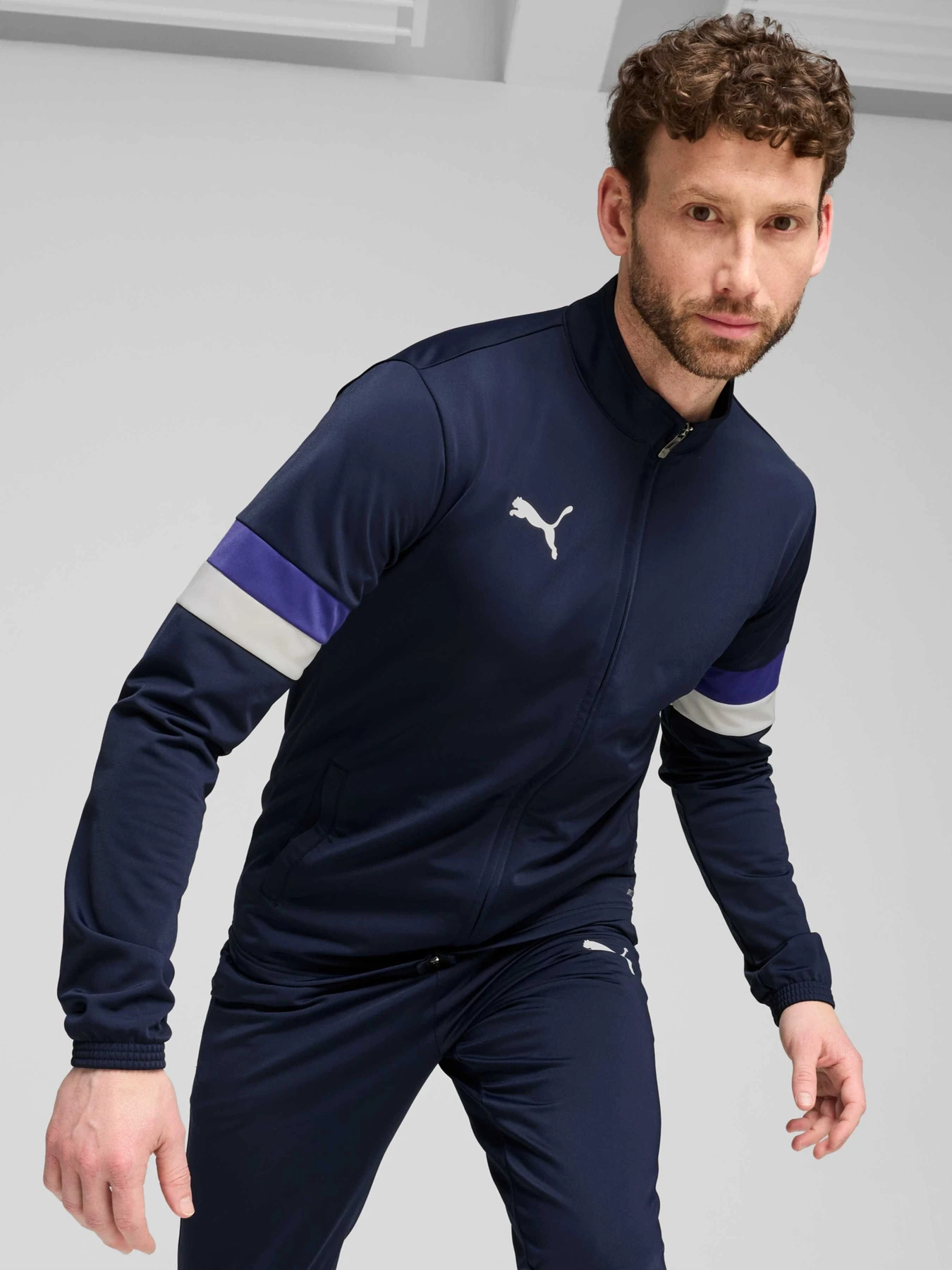 Костюми PUMA Individualrise Tracksuit модель 658996 Костюми PUMA Individualrise Tracksuit модель 658996 Фото