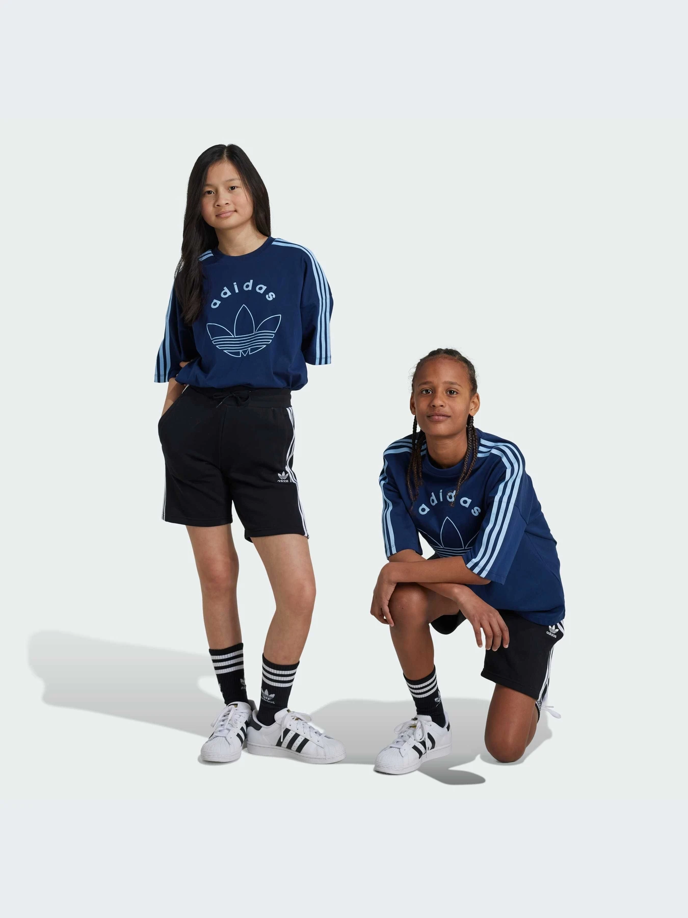 Шорты Adidas Adicolor модель IY7481 Шорты Adidas Adicolor модель IY7481 Фото