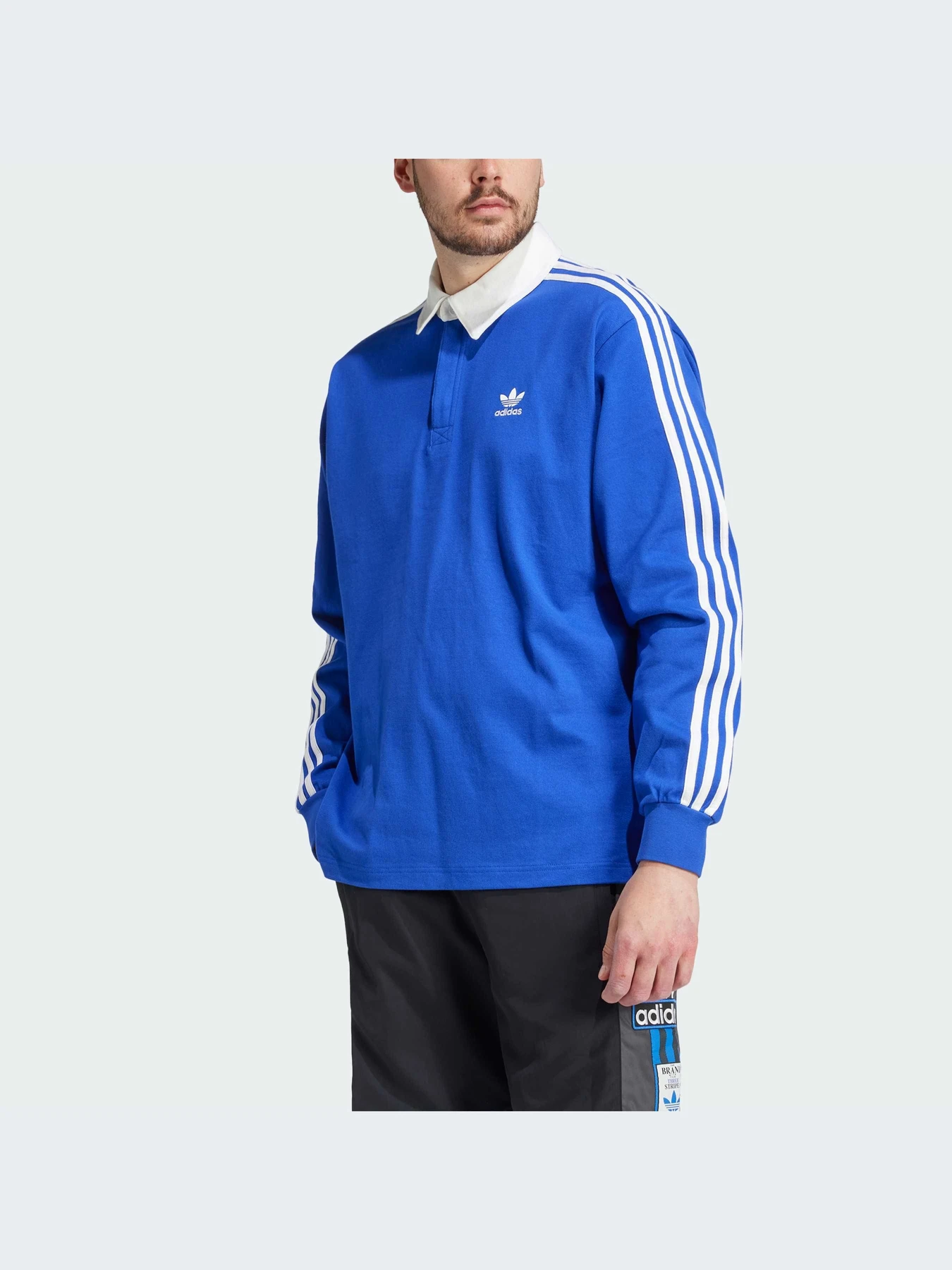 Футболки і поло Adidas Adicolor модель IZ2465 Футболки і поло Adidas Adicolor модель IZ2465 Фото