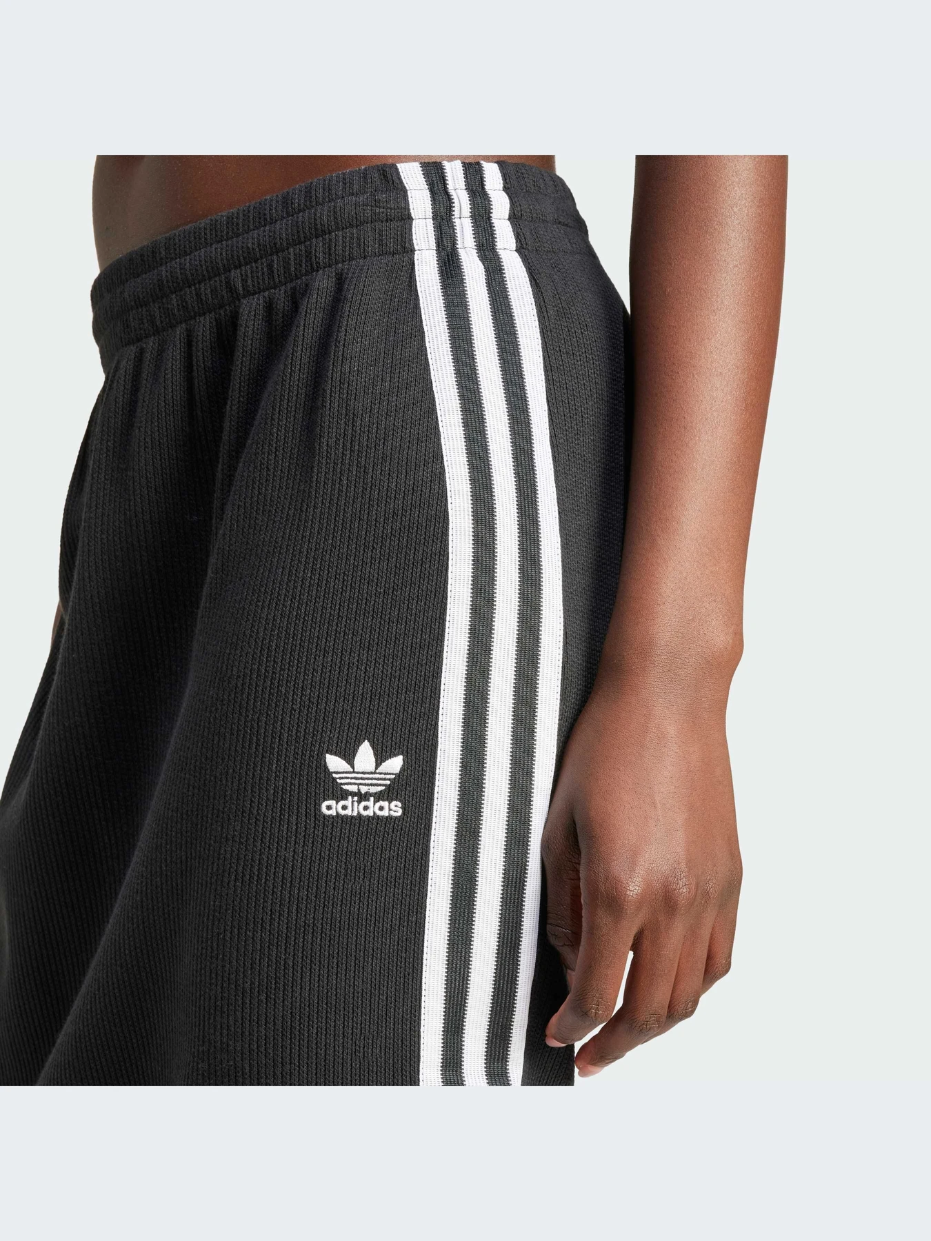 Юбки Adidas Adicolor модель IY7279 Юбки Adidas Adicolor модель IY7279 Фото