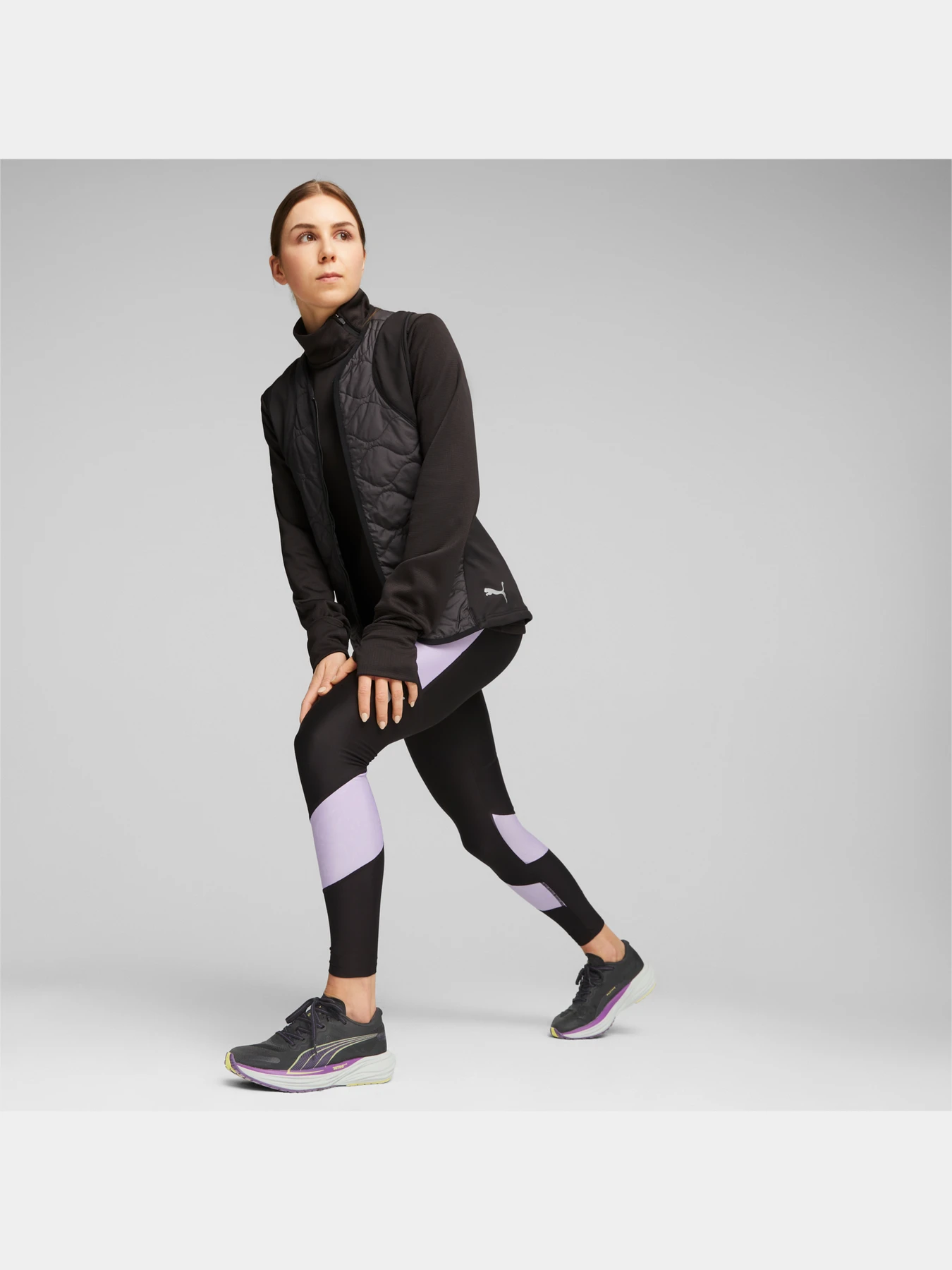 Куртки и дубленки PUMA Run Wrmlbl Padded Vest W модель 524057 Фото