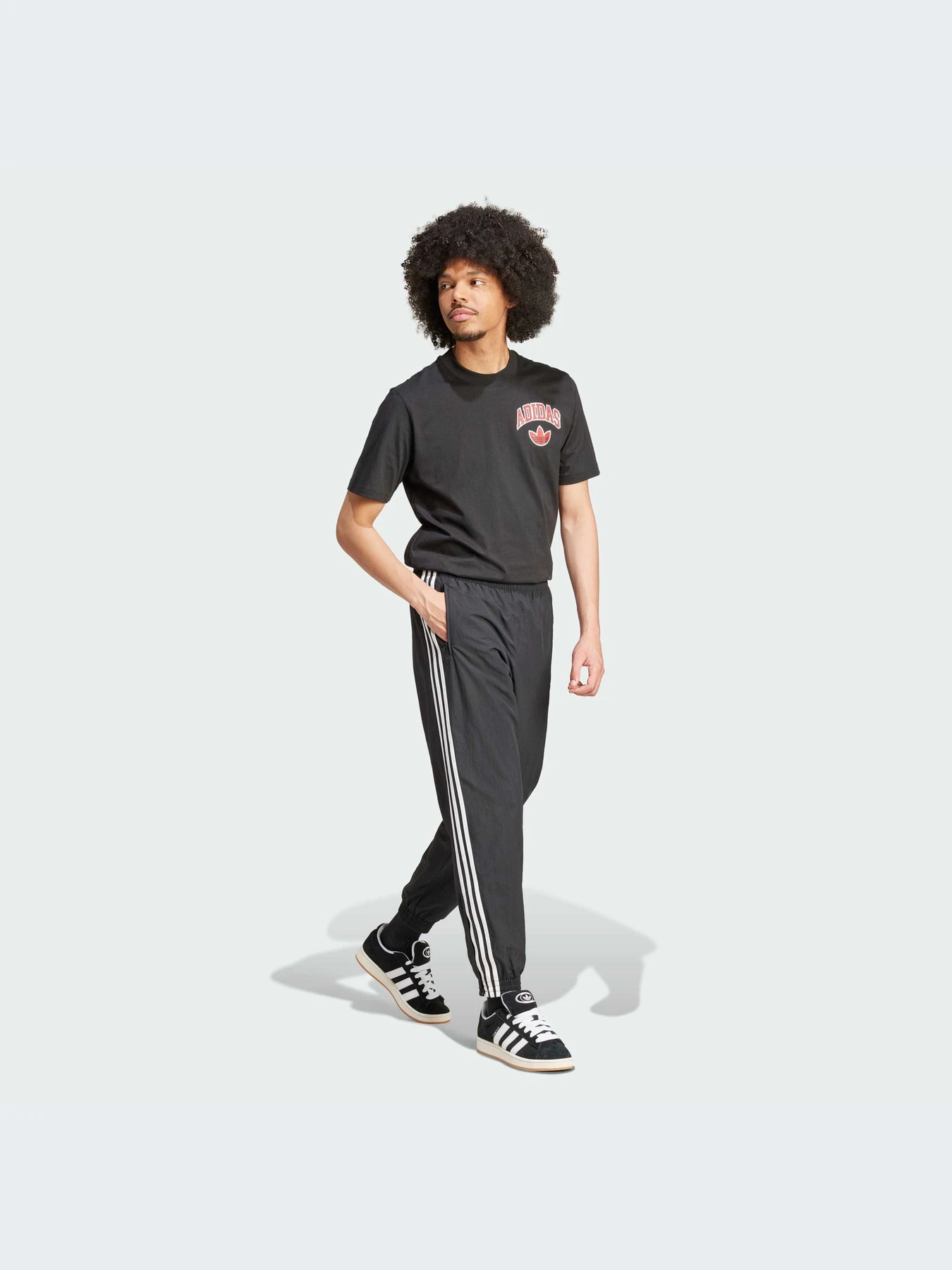Футболки і поло Adidas Graphics модель IX6760 Футболки і поло Adidas Graphics модель IX6760 Фото
