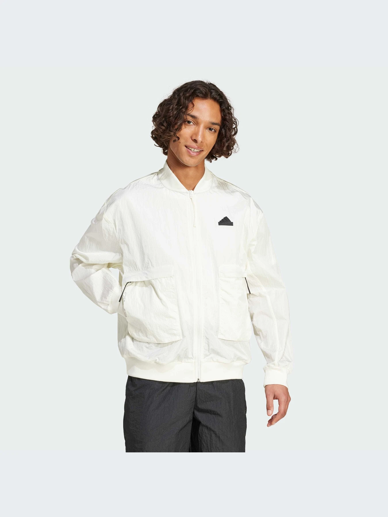 Куртки и дубленки Adidas модель IV7427 Фото