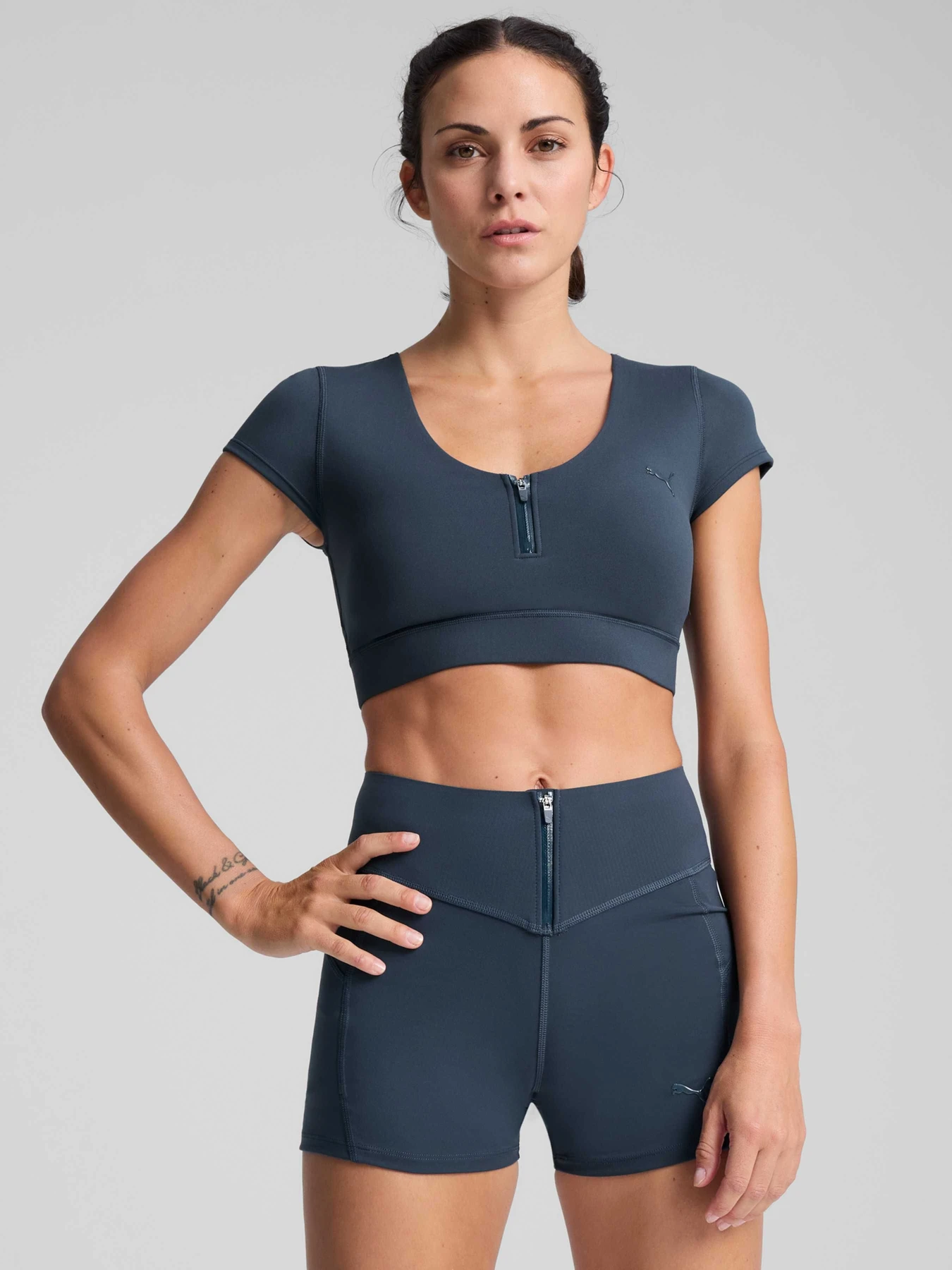 Футболки і поло PUMA Zip Crop Bra Tee модель 526812 Фото