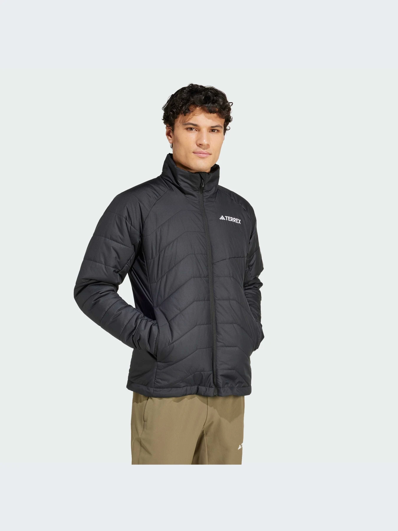 Куртки та дублянки Adidas модель IM7689 Фото