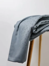 Наволочка сіро-блакитна з вишитими зірками Cozy модель 8008379 Фото