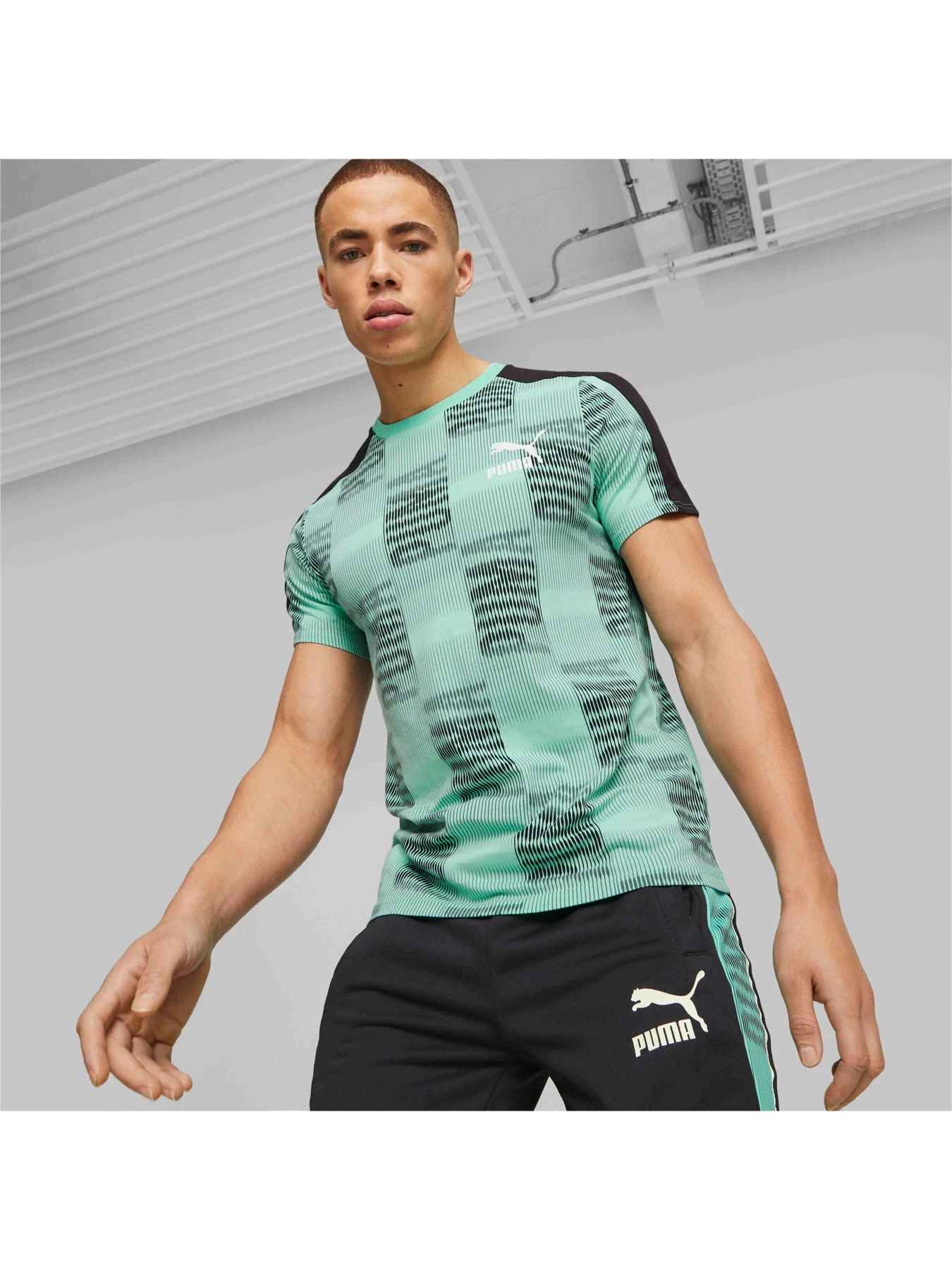 Футболки і поло PUMA T7 Sport Tee модель 539626 Фото