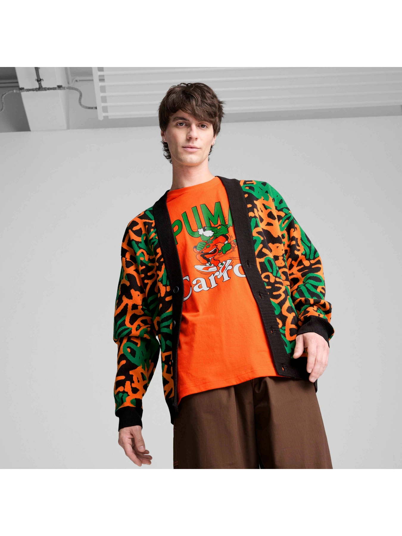 Светри та кардигани PUMA x Carrots Aop Cardigan модель 627446 Светри та кардигани PUMA x Carrots Aop Cardigan модель 627446 Фото