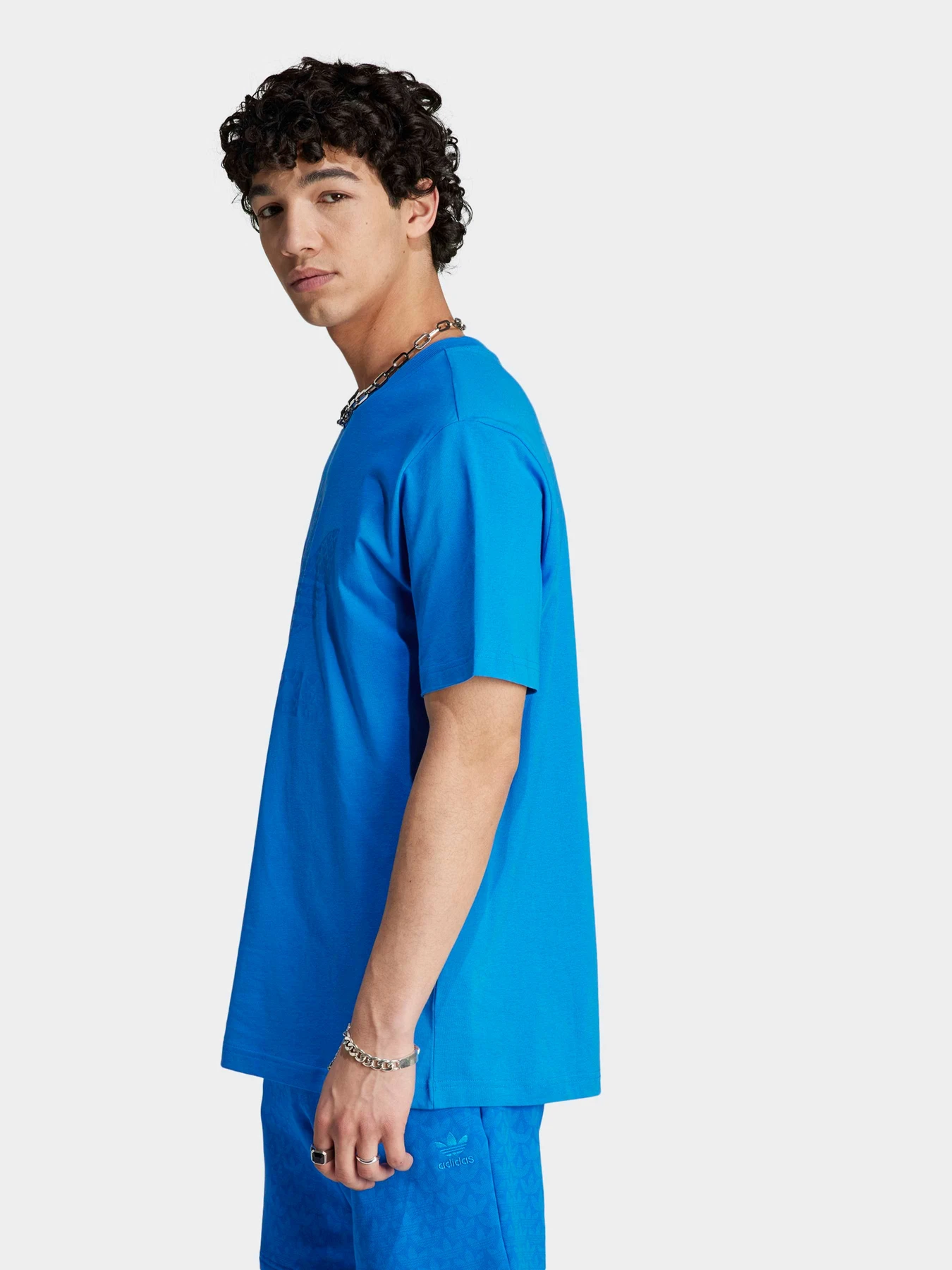 Футболки і поло Adidas Graphics модель IL5138 Футболки і поло Adidas Graphics модель IL5138 Фото