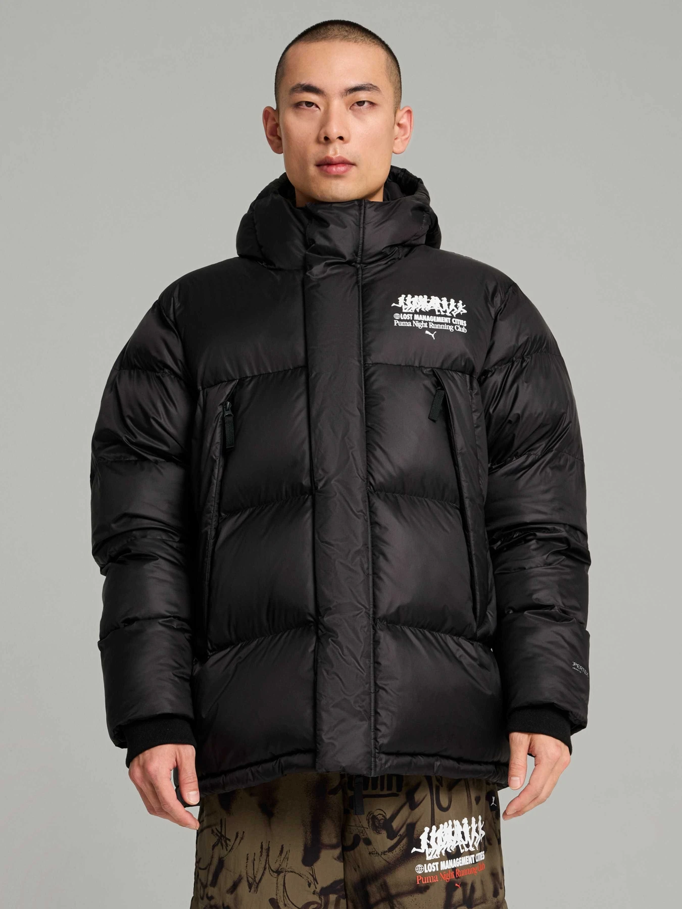 Куртки та дублянки PUMA x Lmc Mmq Pertex Jacket модель 626557 Фото