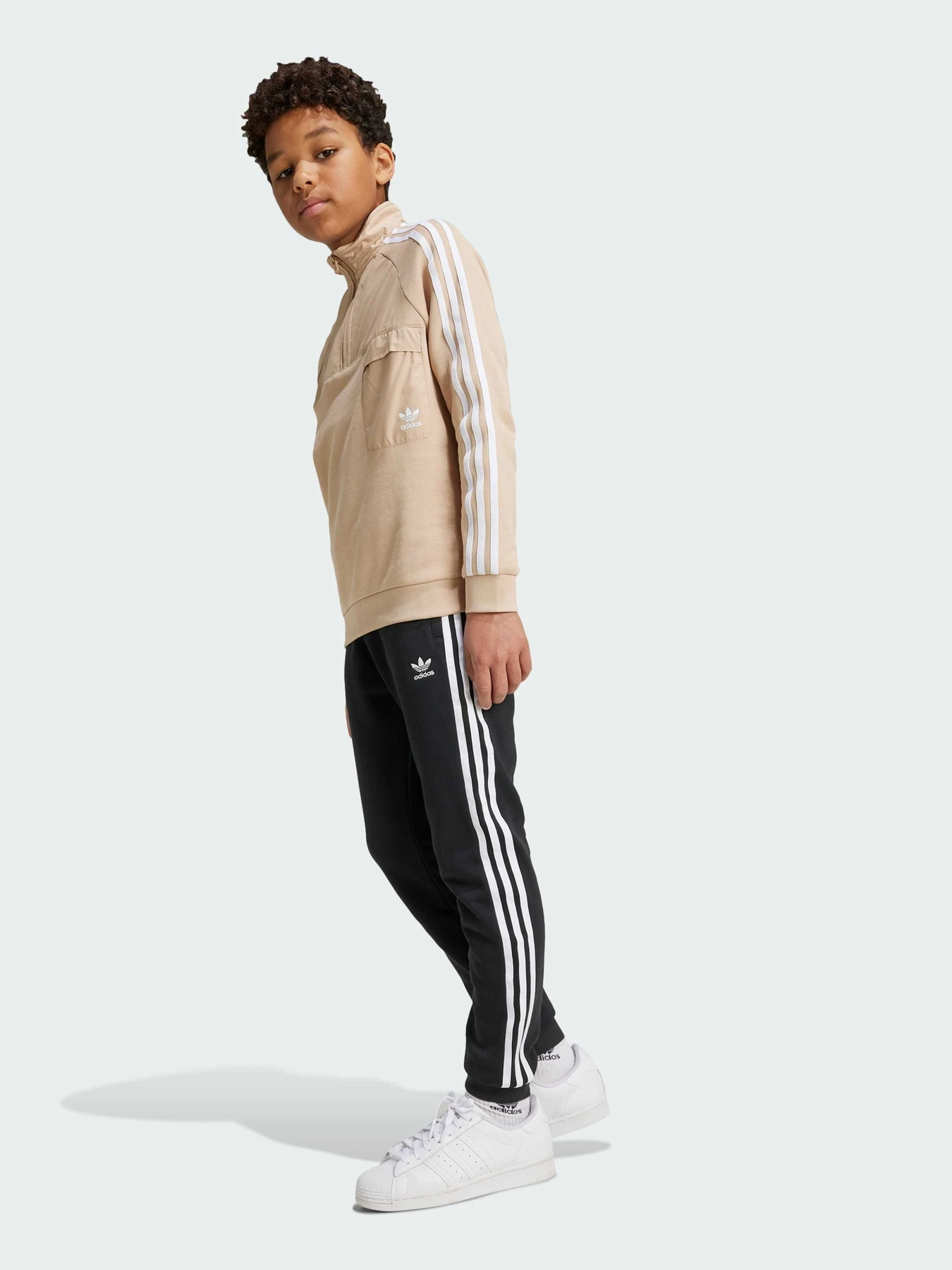 Брюки Adidas Adicolor модель IY7484 Брюки Adidas Adicolor модель IY7484 Фото