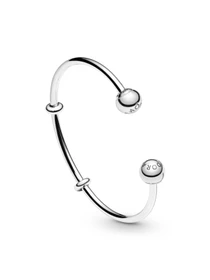 Банглы PANDORA Moments модель 596477 Фото