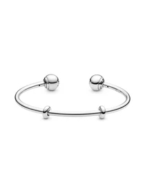Банглы PANDORA Moments модель 596477 Фото