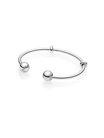 Банглы PANDORA Moments модель 596477 Фото