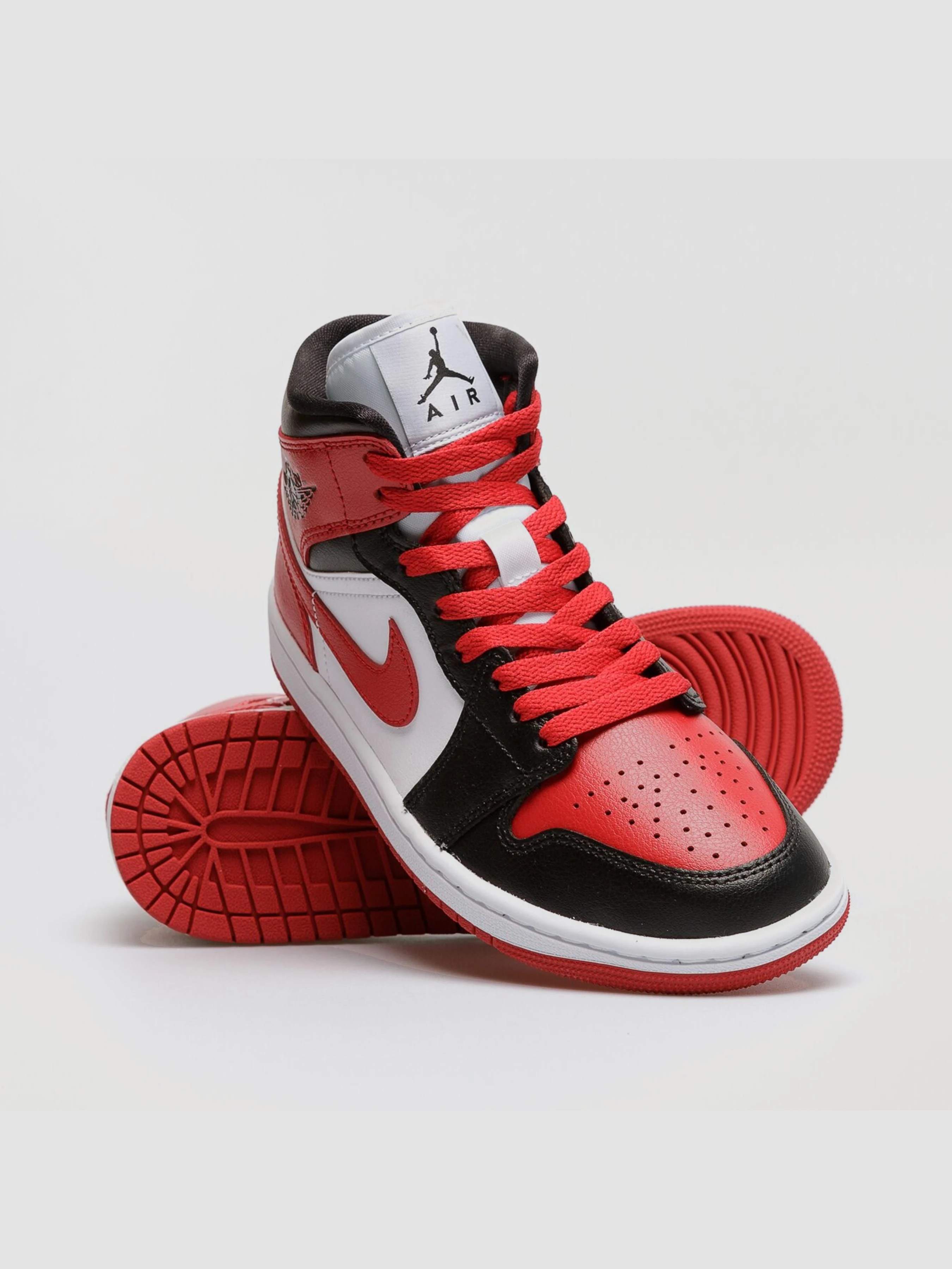Шкіряні Жіночі Кросівки повсякденні Jordan 1 Mid Bred Toe фото 3