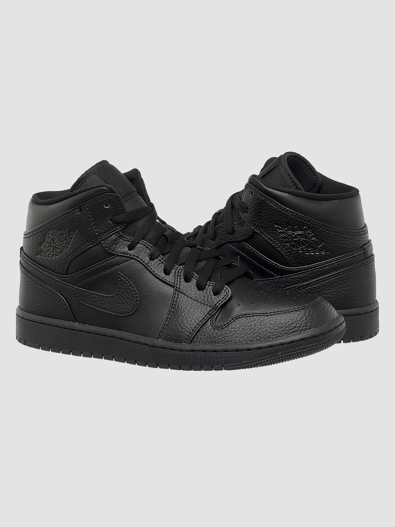 Кроссовки Jordan 1 Mid Triple Black модель 554724-091 Кроссовки Jordan 1 Mid Triple Black модель 554724-091 Фото