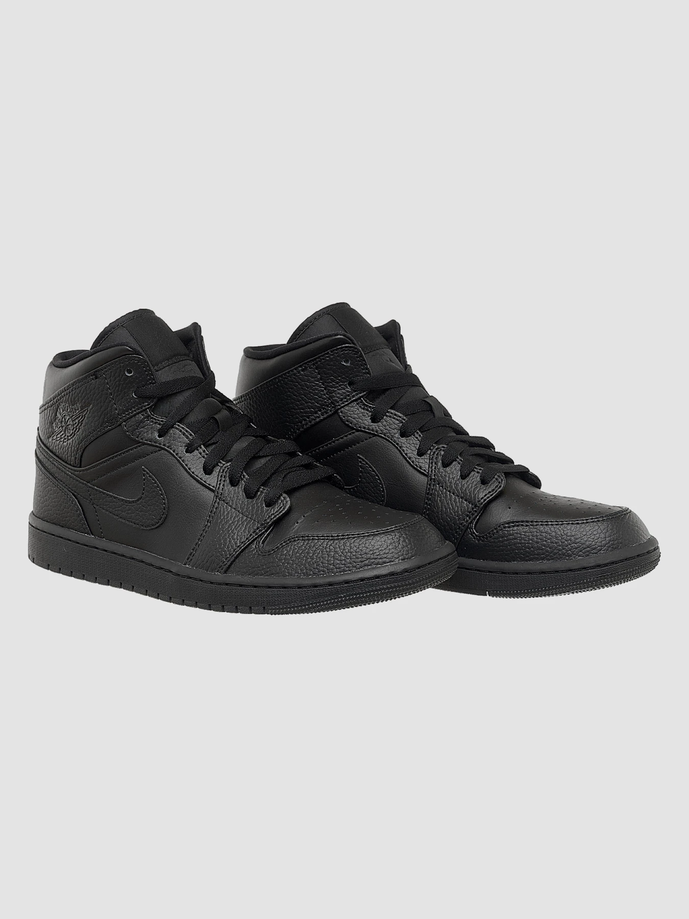 Кроссовки Jordan 1 Mid Triple Black модель 554724-091 Кроссовки Jordan 1 Mid Triple Black модель 554724-091 Фото
