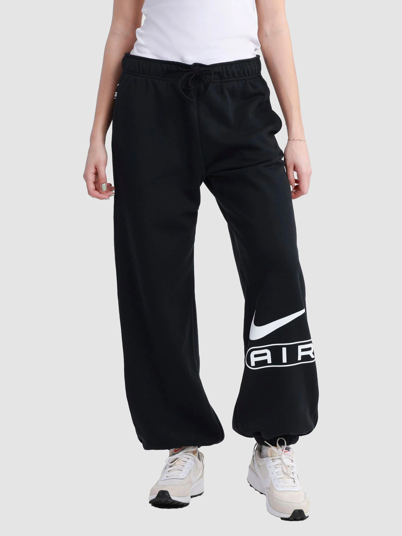 Брюки NIKE W Nsw Air Mr Flc Jogger модель FN1902-010 Брюки NIKE W Nsw Air Mr Flc Jogger модель FN1902-010 Фото