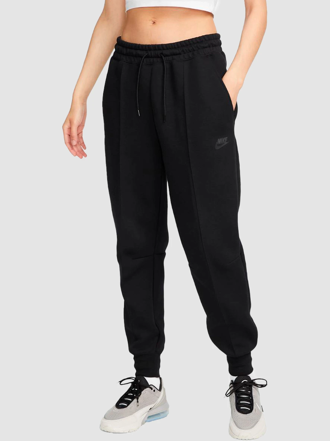 Брюки NIKE W Nsw Tch Flc Mr Jggr модель FB8330-010 Брюки NIKE W Nsw Tch Flc Mr Jggr модель FB8330-010 Фото