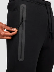 Брюки NIKE M Nk Tch Flc Jggr модель FB8002-010 Фото