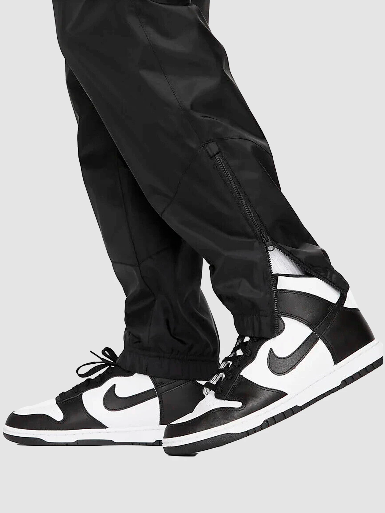 Брюки NIKE Windrunner модель DX0653-011 Фото