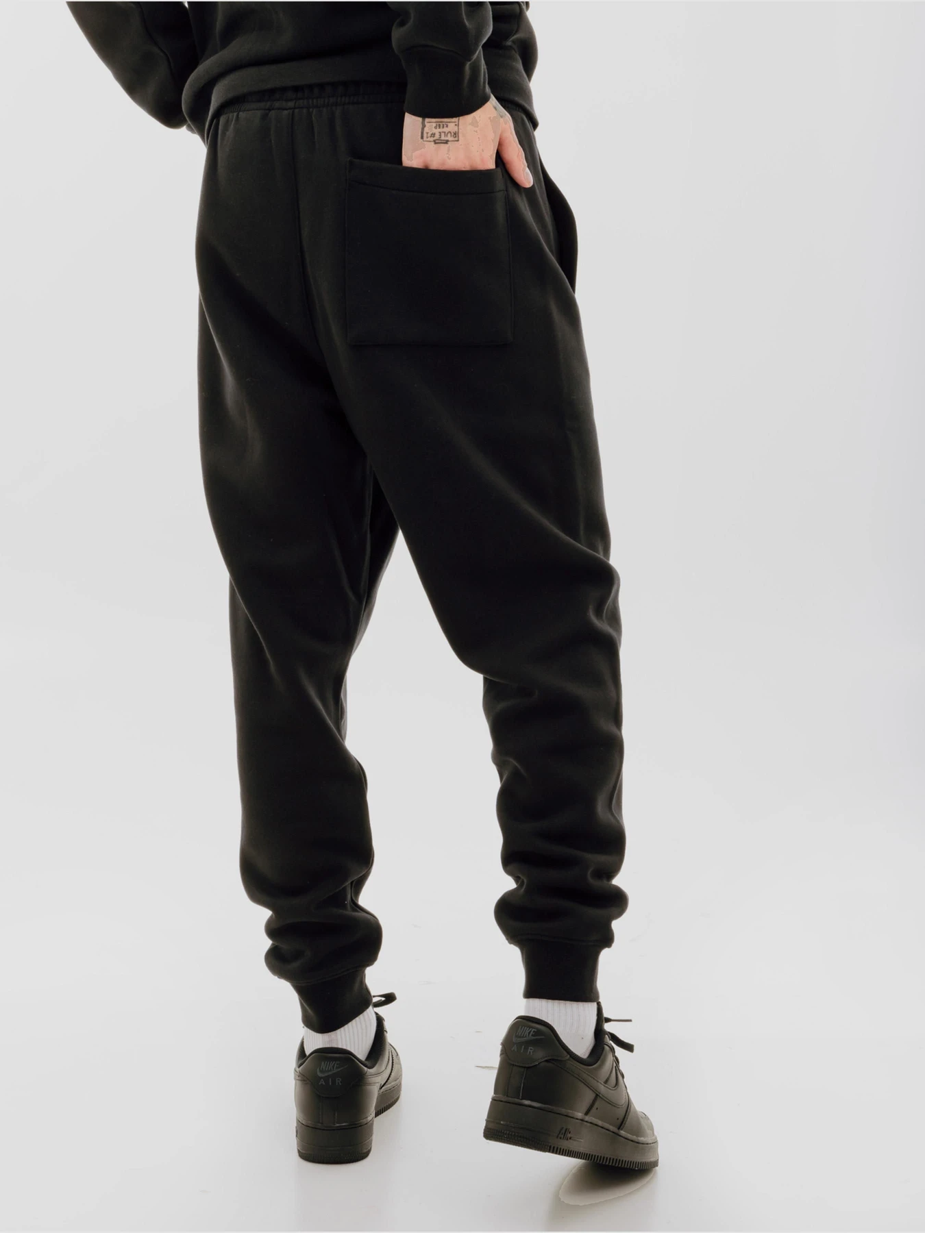 Брюки Jordan Essentials Fleece Baseline Trousers модель FD7345-010 Фото