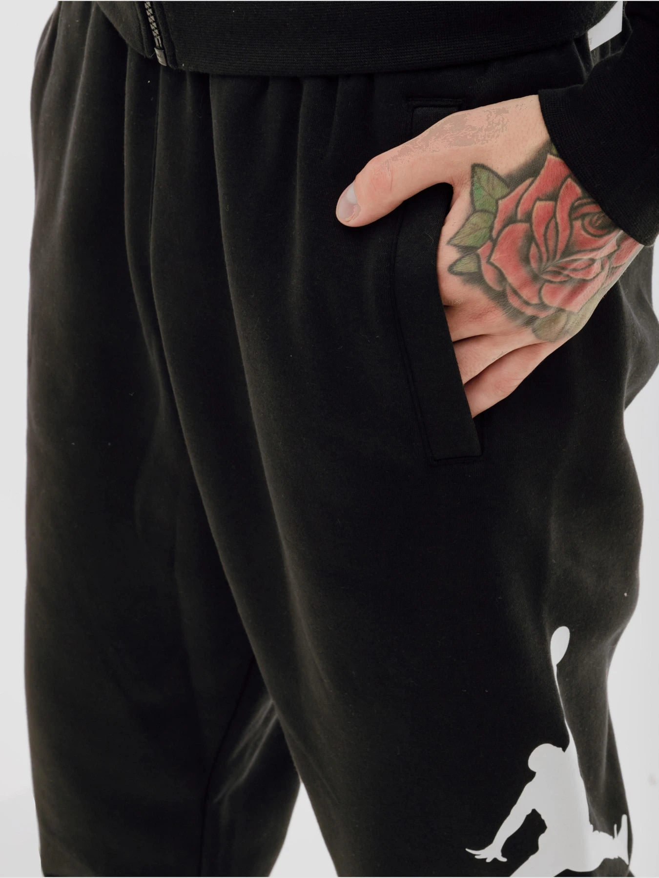 Брюки Jordan Essentials Fleece Baseline Trousers модель FD7345-010 Фото