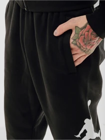 Брюки Jordan Essentials Fleece Baseline Trousers модель FD7345-010 Фото