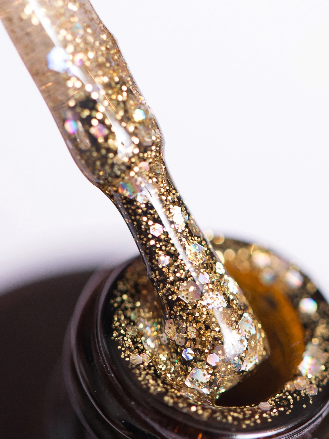 Гель-лак GLOSS Shine 409, золотистый с голографическими блестками Shine GLOSS COMPANY модель 4823271403389 Гель-лак GLOSS Shine 409, золотистый с голографическими блестками Shine GLOSS COMPANY модель 4823271403389 Фото