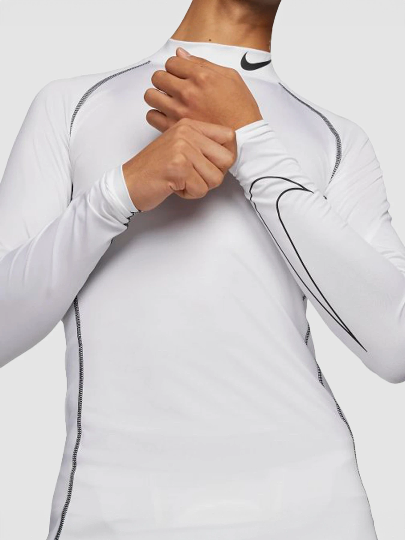 Худі та світшоти NIKE Pro Dri-Fit Mock Long-Sleeve Tight Top модель DD1986-100 Худі та світшоти NIKE Pro Dri-Fit Mock Long-Sleeve Tight Top модель DD1986-100 Фото
