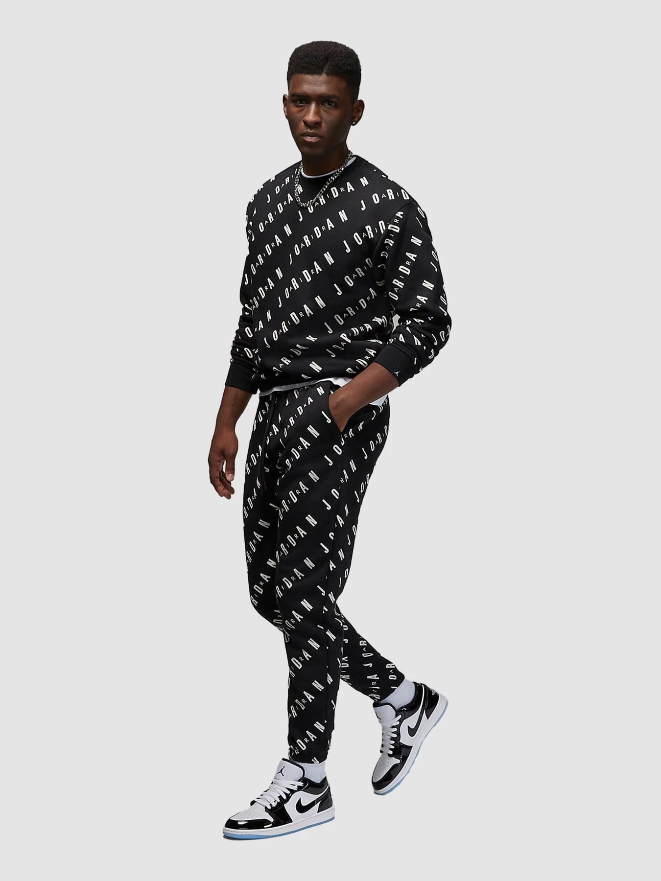 Штани Jordan Aop Graphics Fleece Pants модель DV7646-010 Фото