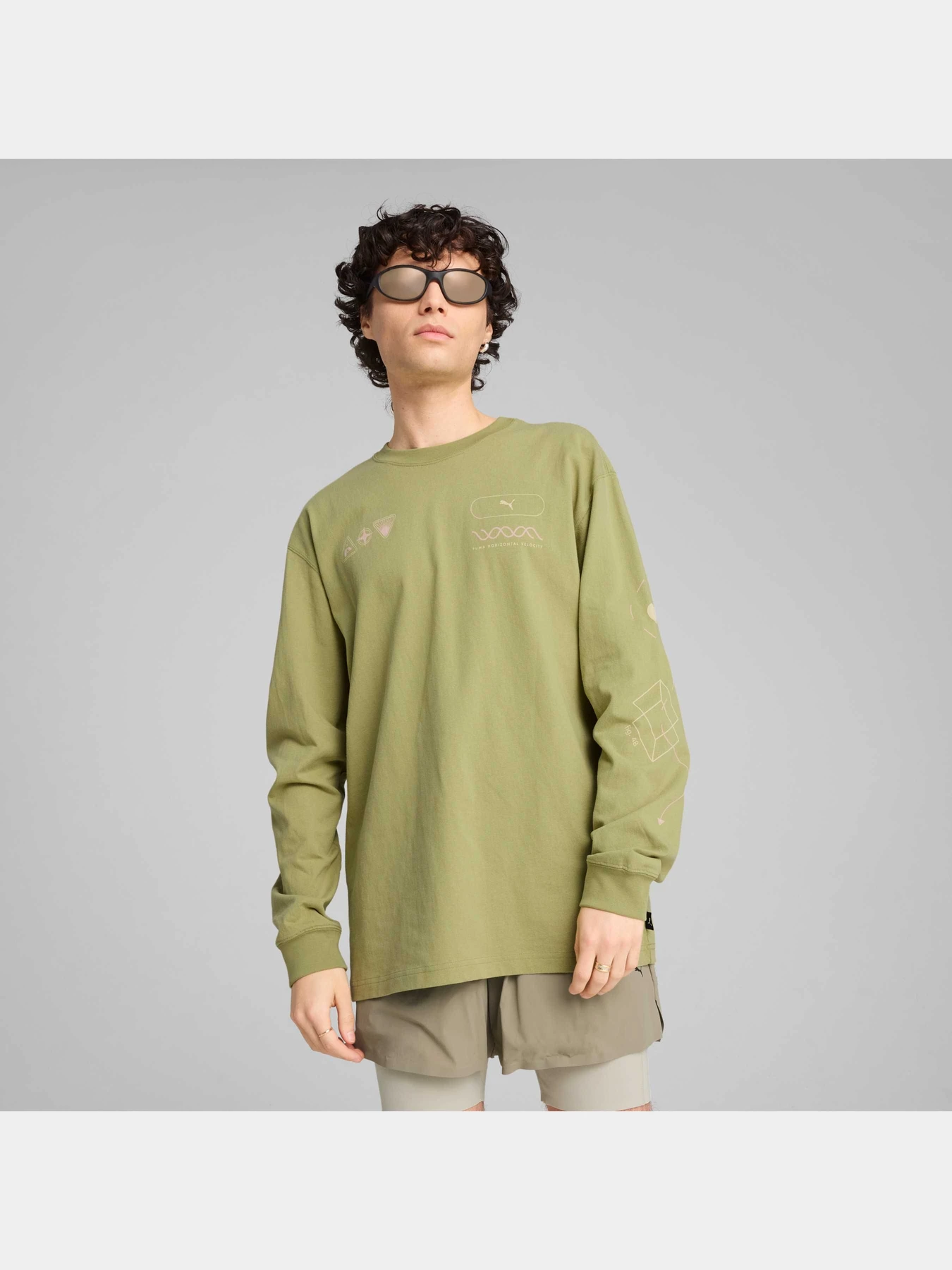 Худі та світшоти PUMA Graphics Celerity Longsleeve модель 630252 Худі та світшоти PUMA Graphics Celerity Longsleeve модель 630252 Фото