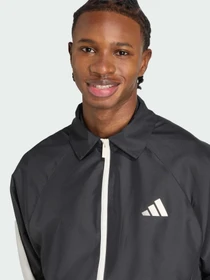 Куртки и дубленки Adidas модель JN1829 Фото